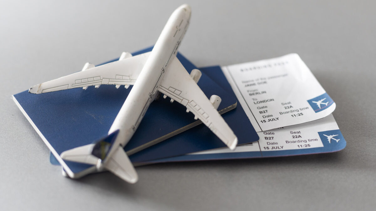 airline tickets and documents on wooden table top 2025 01 08 11 44 42 utc